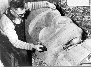 Mungo Martin carving a pole