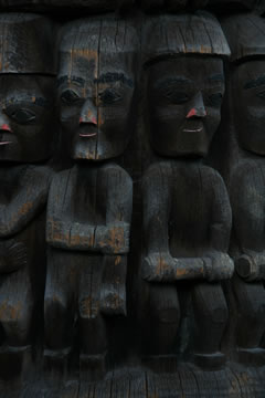 Close up of eleven small human figures
